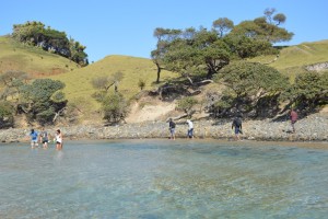 Knee-deep river crossing to Mapuzi Cliffs